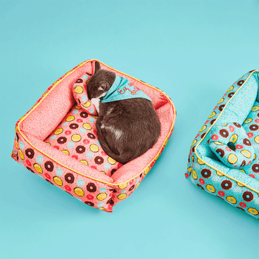 Gato-Dormindo-na-Cama-Donuts-Emporium-Distripet