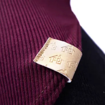 Regata-Canelada-Roxa-Fabrica-Pet-tamanho-PP-foto-de-detalhe-da-etiqueta-